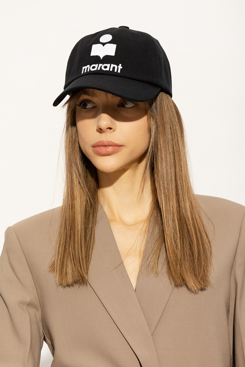 SchaferandweinerShops Spain - Melania Trump wearing a white hat in Kenya -  Black 'Tyron' baseball cap Isabel Marant